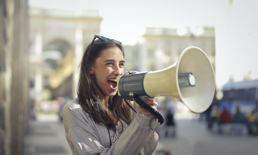 Young worker megaphone